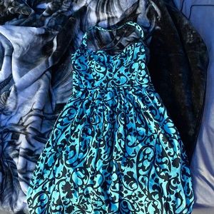 A black and turquoise dress